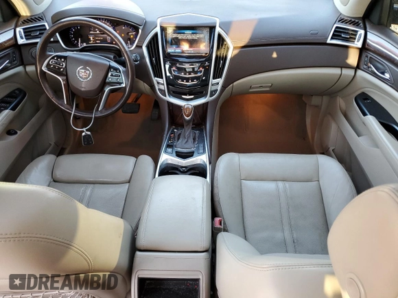 2015 Cadillac SRX Performance Collection z VIN 3GYFNCE37FS525052, wystawiony jako Copart lot #50101105 z przebiegiem 138 471 mil mil oraz Szkoda całkowita • Salvage title. Historia ofert i sprzedaży dostępna na DreamBid. Obrazek 8.