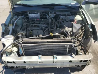 2010 Ford Focus SE with VIN 1FAHP3FN1AW227852, listed as a Copart auction lot 56392435 with 145,047 mi miles and Salvage Title. Bid and sale history available at DreamBid. Image 11.