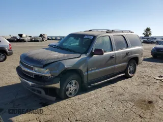 2002 Chevrolet Tahoe LT with VIN 1GNEC13T22R263962, listed as a Copart auction lot 72726674 with 258,148 mi miles and Salvage Title. Bid and sale history available at carsss.com. Image 1.