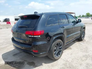 2019 Jeep Grand Cherokee Altitude with VIN 1C4RJEAG0KC857787, listed as a IAAI auction lot 42434646 with 193,968 mi miles and . Bid and sale history available at DreamBid. Image 4.