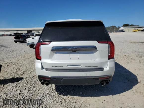 2023 GMC Yukon Denali Ultimate with VIN 1GKS2EKL0PR132029, listed as a Copart auction lot 77234034 with 58,071 mi miles and Salvage Title. Bid and sale history available at carsss.com. Image 6.