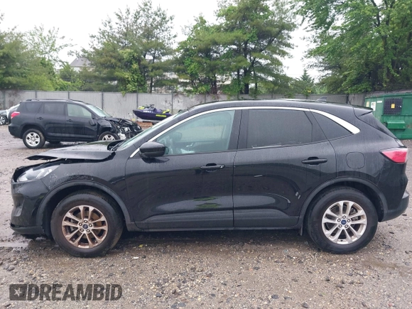 2021 Ford Escape SE with VIN 1FMCU9G67MUA23303, listed as a IAAI auction lot 42232319 with 12,694 mi miles and . Bid and sale history available at DreamBid. Image 14.