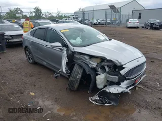 2020 Ford Fusion Titanium with VIN 3FA6P0D98LR115437, listed as a IAAI auction lot 42331052 with 127,346 mi miles and . Bid and sale history available at DreamBid. Image 1.