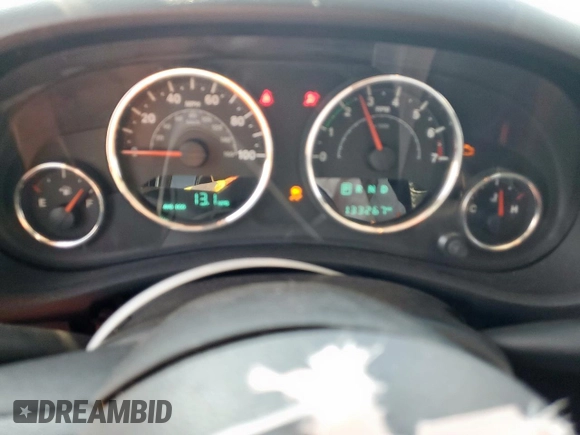 2017 Jeep Wrangler Unlimited Sahara with VIN 1C4HJWEG0HL585262, listed as a Copart auction lot 58748155 with 133,267 mi miles and Salvage title. Bid and sale history available at DreamBid. Image 9.