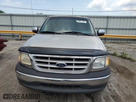 1999 Ford F-250 with VIN 1FTRX27LXXNC18863, listed as a Copart auction lot 63051395 with 118,695 mi miles and Clean title. Bid and sale history available at DreamBid. Image 5.