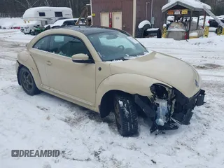 2019 Volkswagen Beetle S with VIN 3VWFD7AT1KM703684, listed as a IAAI auction lot 41571691 with 111,180 mi miles. Bid and sale history available at carsss.com. Image 1.