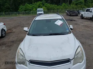 2013 Chevrolet Equinox LT z VIN 1GNALPEK8DZ109684, wystawiony jako IAAI lot #42215573 z przebiegiem 161 682 mil mil oraz . Historia ofert i sprzedaży dostępna na DreamBid. Obrazek 11.