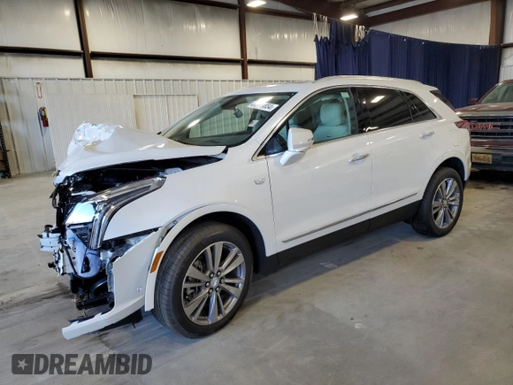 2025 Cadillac XT5 FWD Premium Luxury with VIN 1GYKNCRSXSZ106707, listed as a Copart auction lot 86919854 with 1,879 mi miles and Salvage Title. Bid and sale history available at DreamBid. Image 1.