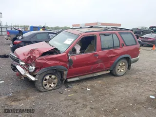 1996 Nissan Pathfinder XE with VIN JN8AR05Y1TW049898, listed as a IAAI auction lot 39081336 with 326,792 mi miles. Bid and sale history available at carsss.com. Image 2.