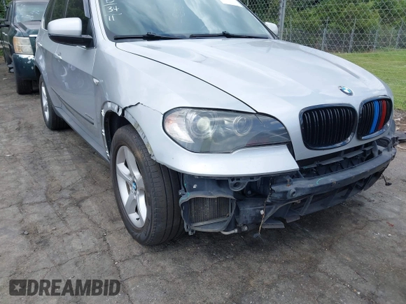 2011 BMW X5 50i with VIN 5UXZV8C55BL419654, listed as a IAAI auction lot 42752609 with 204,677 mi miles and . Bid and sale history available at DreamBid. Image 12.