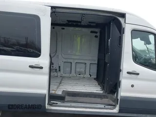 2015 Ford Transit Cargo z VIN 1FTNR2CM4FKA84584, wystawiony jako IAAI lot #42008193 z przebiegiem 224 453 mil mil oraz . Historia ofert i sprzedaży dostępna na DreamBid. Obrazek 8.