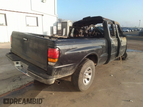 1999 Mazda B-Series 2WD Truck SE with VIN 4F4YR16V8XTM13964, listed as a IAAI auction lot 39963394 with 1 mi miles. Bid and sale history available at carsss.com. Image 4.