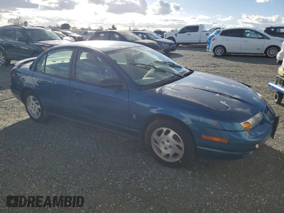 2000 Saturn SL z VIN 1G8ZK5279YZ155916, wystawiony jako Copart lot #44225105 z przebiegiem 97 788 mil mil oraz Szkoda całkowita • Salvage title. Historia ofert i sprzedaży dostępna na DreamBid. Obrazek 4.