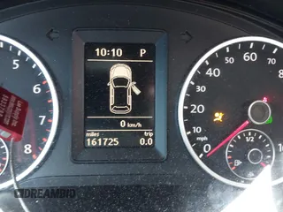 2012 Volkswagen Tiguan LE z VIN WVGAV7AX9CW096668, wystawiony jako IAAI lot #41664461 z przebiegiem 161 725 mil mil oraz . Historia ofert i sprzedaży dostępna na DreamBid. Obrazek 7.