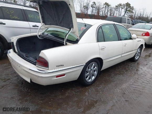2004 Buick Park Avenue Ultra with VIN 1G4CU541544134529, listed as a IAAI auction lot 41604400 with 999999 miles. Bid and sale history available at carsss.com. Image 4.
