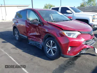 2018 Toyota RAV4 XLE with VIN JTMWFREV6JD117500, listed as a IAAI auction lot 42258588 with Not provided miles and . Bid and sale history available at DreamBid. Image 12.