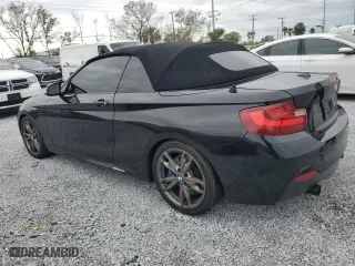 2015 BMW 2 Series M235i with VIN WBA1M1C54FV393578, listed as a Copart auction lot 88945735 with 95,713 mi miles and Salvage Title. Bid and sale history available at carsss.com. Image 2.