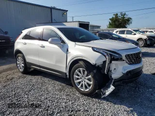 2023 Cadillac XT4 FWD Luxury with VIN 1GYAZAR42PF219114, listed as a Copart auction lot 61830125 with 23,508 mi miles and Salvage title. Bid and sale history available at DreamBid. Image 4.