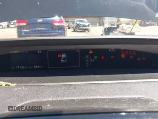 2016 Toyota Prius Four z VIN JTDKARFU7G3017018, wystawiony jako IAAI lot #42224376 z przebiegiem 74 136 mil mil oraz . Historia ofert i sprzedaży dostępna na DreamBid. Obrazek 7.