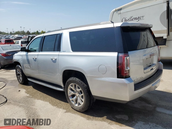 2015 GMC Yukon XL SLE with VIN 1GKS2GKC4FR678777, listed as a Copart auction lot 68642194 with 151,909 mi miles and Salvage Title. Bid and sale history available at carsss.com. Image 2.