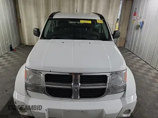 2011 Dodge Nitro SE z VIN 1D4PT2GK2BW589063, wystawiony jako IAAI lot #42408917 z przebiegiem 160 504 mil mil oraz . Historia ofert i sprzedaży dostępna na DreamBid. Obrazek 40.