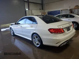 2014 Mercedes-Benz E-Class E 350 Luxury with VIN WDDHF8JB3EA928425, listed as a Copart auction lot 50696365 with 122,589 mi miles and Salvage Title. Bid and sale history available at carsss.com. Image 2.