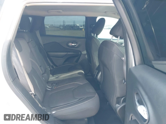 2016 Jeep Cherokee Latitude with VIN 1C4PJMCS1GW185442, listed as a IAAI auction lot 42033699 with 123,306 mi miles. Bid and sale history available at carsss.com. Image 8.