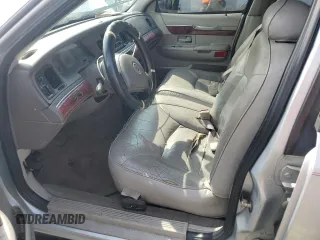 2001 Mercury Grand Marquis LS z VIN 2MEFM75W31X704781, wystawiony jako Copart lot #54613735 z przebiegiem 191 323 mil mil oraz Szkody całkowita. Historia ofert i sprzedaży dostępna na DreamBid. Obrazek 7.