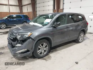 2016 Honda Pilot LX with VIN 5FNYF6H1XGB111488, listed as a IAAI auction lot 41581706 with 100,028 mi miles. Bid and sale history available at carsss.com. Image 2.