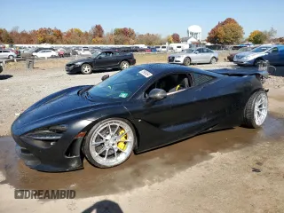 2018 McLaren 720S z VIN SBM14DCA9JW001142, wystawiony jako Copart lot #76969554 z przebiegiem Nie podano mil oraz Szkody całkowita. Historia ofert i sprzedaży dostępna na DreamBid. Obrazek 1.