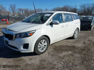 2017 Kia Sedona L with VIN KNDMA5C10H6257698, listed as a IAAI auction lot 41343330 with 141,352 mi miles. Bid and sale history available at carsss.com. Image 2.