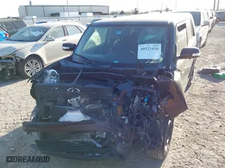 2010 Scion xB with VIN JTLZE4FE8A1113455, listed as a IAAI auction lot 40523410 with 1 mi miles. Bid and sale history available at carsss.com. Image 6.