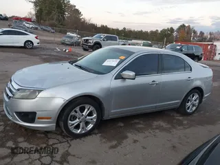 2012 Ford Fusion SE z VIN 3FAHP0HA4CR213409, wystawiony jako IAAI lot #41079155 z przebiegiem 139 129 mil mil oraz . Historia ofert i sprzedaży dostępna na DreamBid. Obrazek 13.