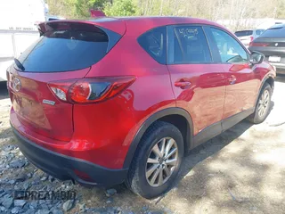 2015 Mazda CX-5 Touring with VIN JM3KE4CY1F0510361, listed as a IAAI auction lot 42134415 with 95,907 mi miles and . Bid and sale history available at carsss.com. Image 4.