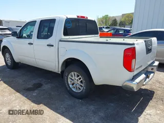 2015 Nissan Frontier SV with VIN 1N6AD0ER9FN732989, listed as a IAAI auction lot 42013726 with 147,596 mi miles and . Bid and sale history available at DreamBid. Image 3.