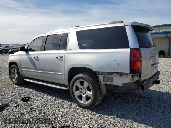 2015 Chevrolet Suburban LTZ with VIN 1GNSKKKC1FR120164, listed as a Copart auction lot 53700455 with 195,815 mi miles and Salvage Title. Bid and sale history available at DreamBid. Image 2.