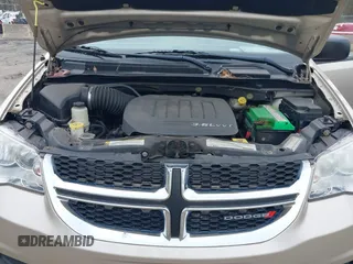 2012 Dodge Grand Caravan SE with VIN 2C4RDGBG4CR298996, listed as a IAAI auction lot 42133423 with 70,354 mi miles and . Bid and sale history available at DreamBid. Image 10.