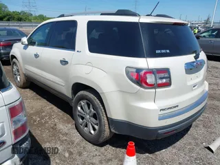 2014 GMC Acadia SLT z VIN 1GKKRRKD3EJ219690, wystawiony jako IAAI lot #42221261 z przebiegiem 103 675 mil mil oraz . Historia ofert i sprzedaży dostępna na DreamBid. Obrazek 3.