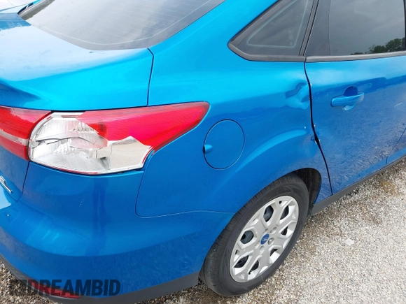 2015 Ford Focus SE z VIN 1FADP3F21FL274182, wystawiony jako IAAI lot #42441161 z przebiegiem 176 810 mil mil oraz . Historia ofert i sprzedaży dostępna na DreamBid. Obrazek 19.