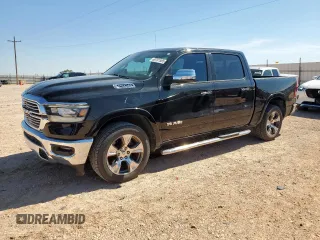 2020 Ram 1500 Laramie with VIN 1C6RREJT8LN306526, listed as a Copart auction lot 60701565 with 74,502 mi miles and Salvage title. Bid and sale history available at DreamBid. Image 1.