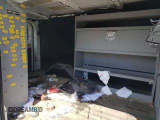 2016 Ford Transit Cargo z VIN 1FTYE1YM6GKB48783, wystawiony jako Copart lot #50741825 z przebiegiem 151 331 mil mil oraz Szkoda całkowita • Salvage title. Historia ofert i sprzedaży dostępna na DreamBid. Obrazek 11.