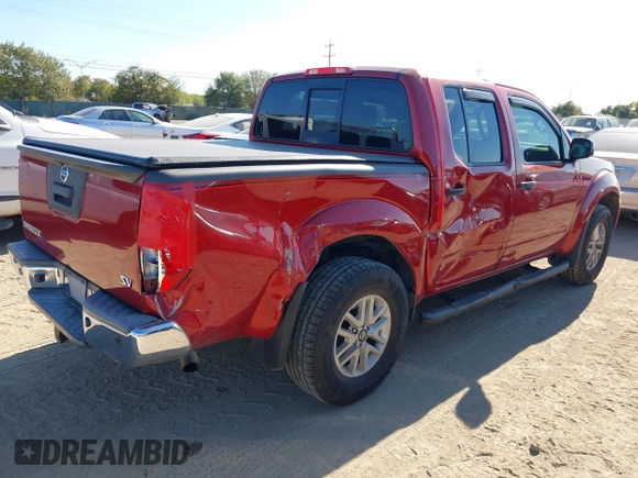 2016 Nissan Frontier S with VIN 1N6AD0ER9GN745596, listed as a IAAI auction lot 40860927 with 136,457 mi miles and . Bid and sale history available at DreamBid. Image 4.