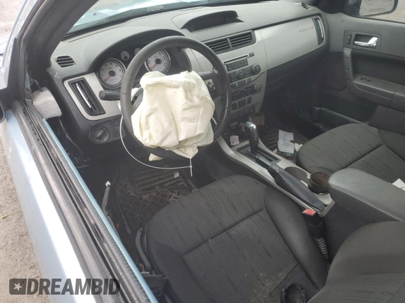 2008 Ford Focus SE z VIN 1FAHP33N48W204502, wystawiony jako Copart lot #53145615 z przebiegiem Nie podano mil oraz Szkoda całkowita • Salvage title. Historia ofert i sprzedaży dostępna na DreamBid. Obrazek 8.