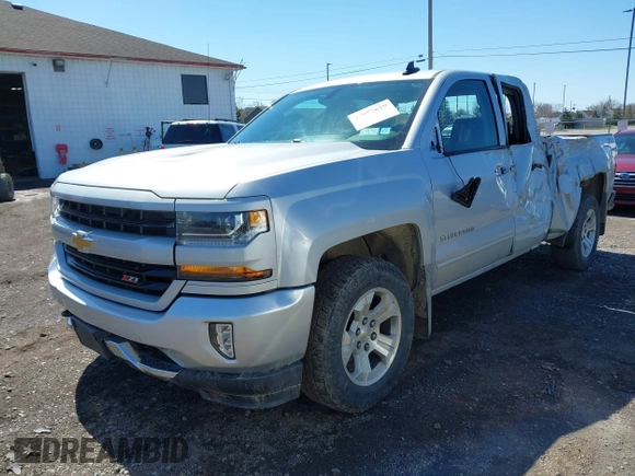 2018 Chevrolet Silverado 1500 LT with VIN 1GCVKREC8JZ237565, listed as a IAAI auction lot 42052619 with 92,790 mi miles and . Bid and sale history available at DreamBid. Image 17.