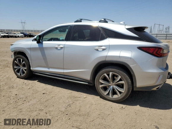 2016 Lexus RX 350 with VIN 2T2ZZMCA8GC016032, listed as a Copart auction lot 58400605 with 142,878 mi miles and Salvage title. Bid and sale history available at DreamBid. Image 2.