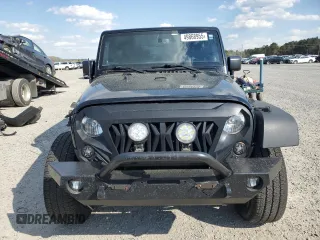 2014 Jeep Wrangler Sport with VIN 1C4AJWAG4EL233014, listed as a Copart auction lot 49868955 with 190,623 mi miles and Salvage Title. Bid and sale history available at carsss.com. Image 5.