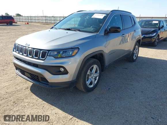 2024 Jeep Compass Latitude with VIN 3C4NJDBN0RT597217, listed as a IAAI auction lot 42503326 with 41,937 mi miles and . Bid and sale history available at DreamBid. Image 2.