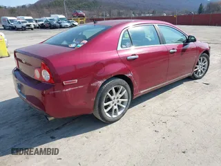 2009 Chevrolet Malibu LTZ with VIN 1G1ZK57709F174297, listed as a IAAI auction lot 41756235 with 146,455 mi miles and . Bid and sale history available at DreamBid. Image 4.