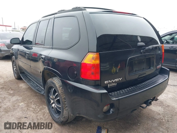 2008 GMC Envoy Denali with VIN 1GKES63M182191403, listed as a IAAI auction lot 41499601 with 217,071 mi miles. Bid and sale history available at carsss.com. Image 3.