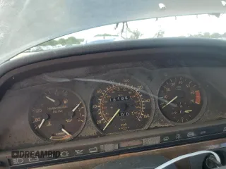 1990 Mercedes-Benz 560 with VIN WDBCA39E1LA513149, listed as a Copart auction lot 65934914 with 181,961 mi miles and Clean Title. Bid and sale history available at DreamBid. Image 9.